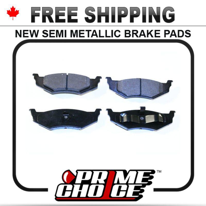 New premium complete set of rear metallic disc brake pads with shims