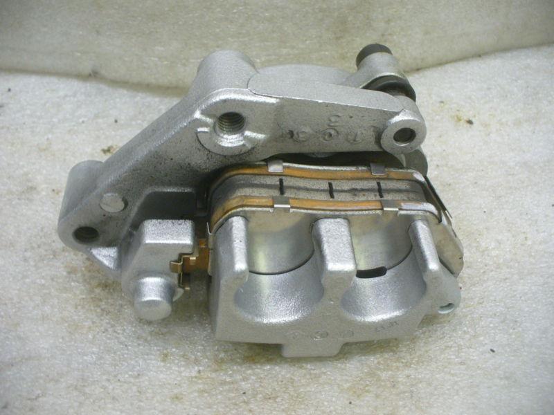 Harley silver front left caliper assembly, #44121-07a.