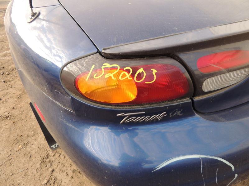 96 97 ford taurus l. tail light sdn quarter panel mounted 428393