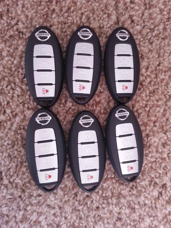 Lot of 7 keyless entry nissan keyfobs