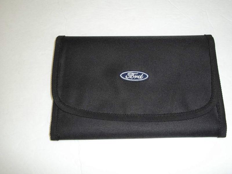 Ford owners manual cover with the blue ford logo on front