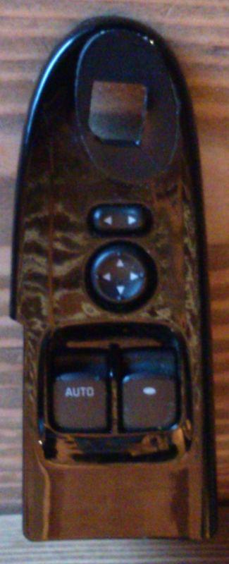 Saturn sky driver side window/mirror controls