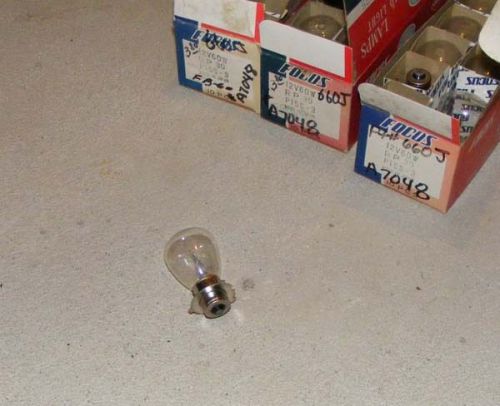 A519 lot of 23 vintage snowmolbile headlight bulbs 660j a7048 12v60w p15s-3 nos