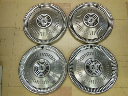 Vintage set of tire/wheel hub caps, 4 pcs. good condition.14 1/2 inch diameter