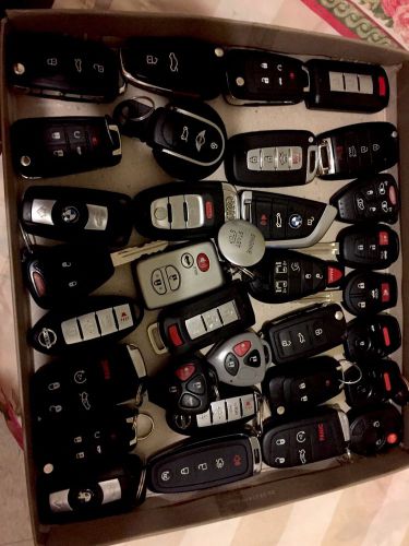 Lot of 32 use key fobs..