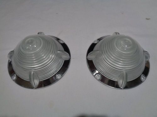 1955 ford , nos rt. and lf. front parking / signal light lens