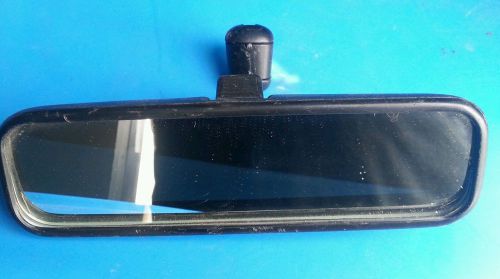 95-01 geo chevy metro oem rear view mirror