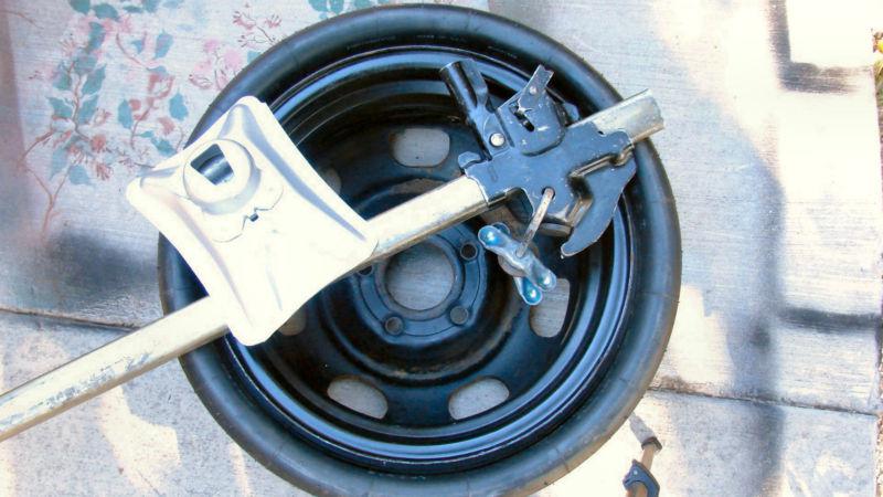 Nos 1973-1978 cadillac eldorado goodyear spare tire w/bumper jack & bracket