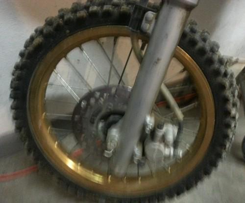 Rm75 kx65 front wheel gold with good tire