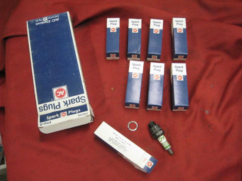 Nos ac r44 ac acniter spark plugs #5612071 with 4 green rings 1950's gm cadillac