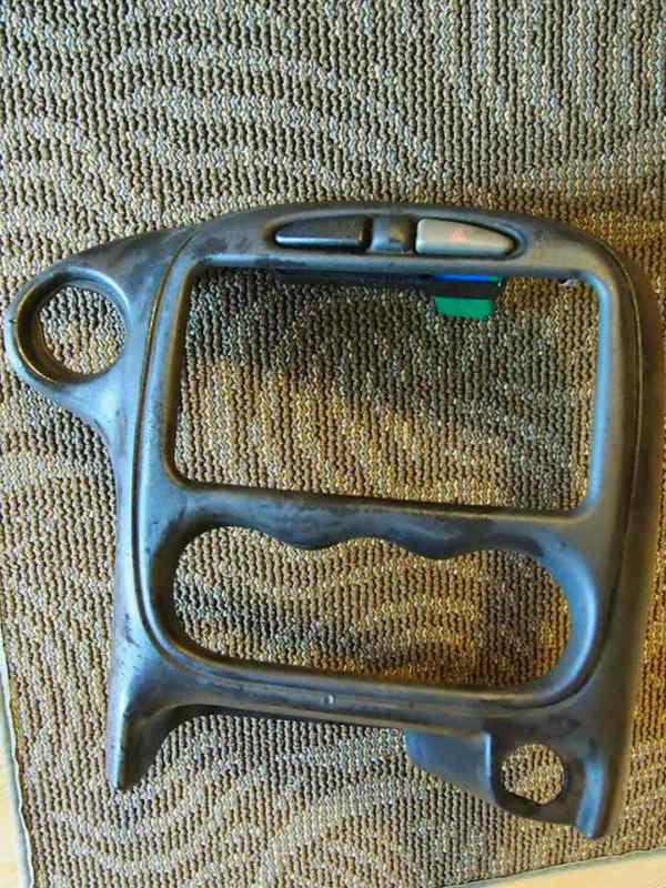 99,00,01,02,03,04,05 pontiac grand am radio dash bezel w/ haz switch