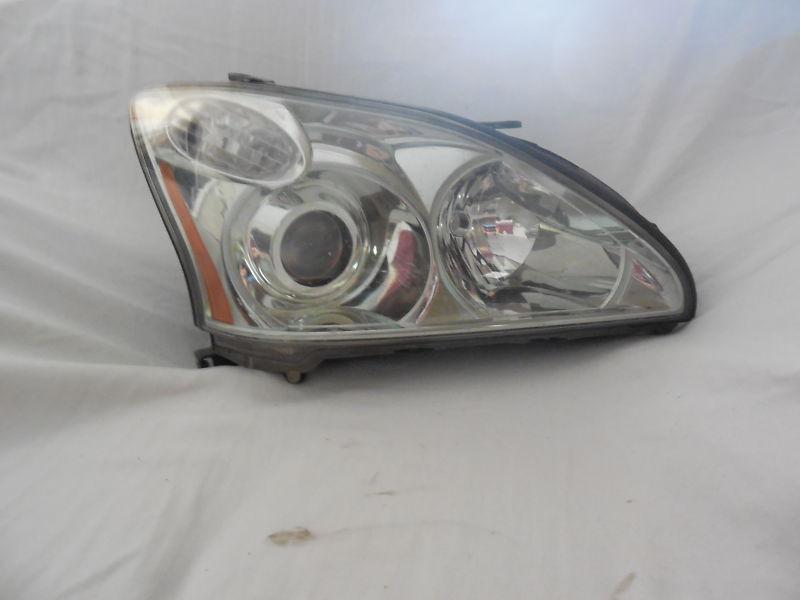 Lexus headlamp and hosing 81145-0e031 (b)