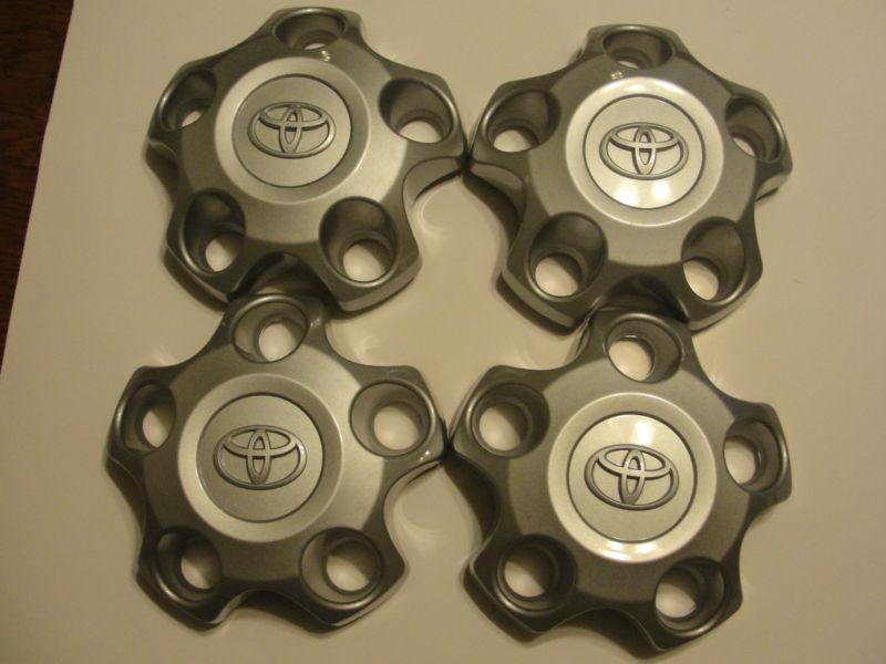 Purchase SET OF 4 TOYOTA TUNDRA CENTER CAPS / HUBCAPS in Washington, NC