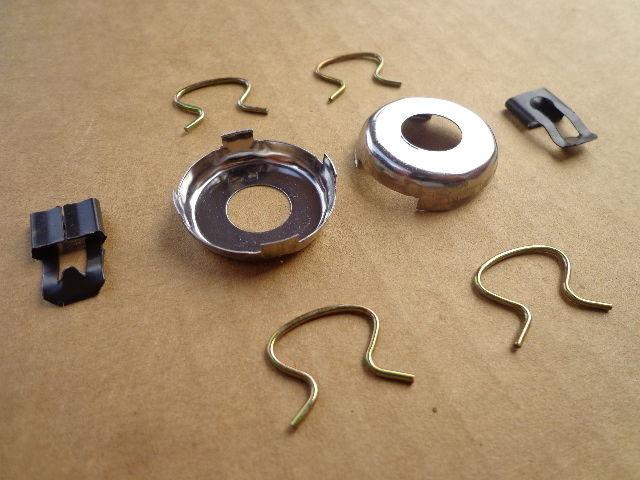 -->-->--> 2 door lock retainers, 2 lock cylinder caps, & 4 crank knob clips 7911