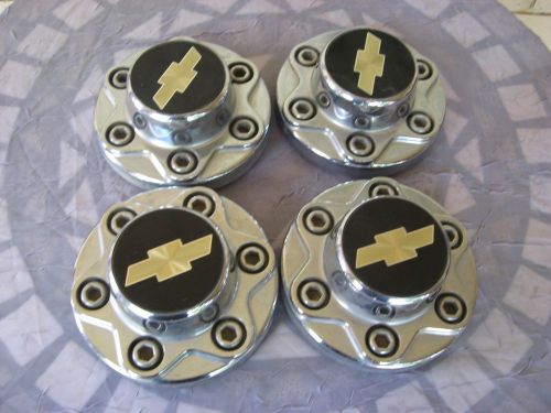 Set of 4 silver chevy center resin caps part# 15550420-b/15550430-c 7&#034; diameter