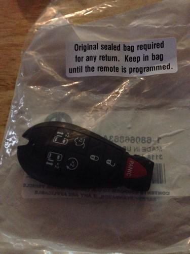 Vw routan 7 button remote fobik brand new, sealed from vw