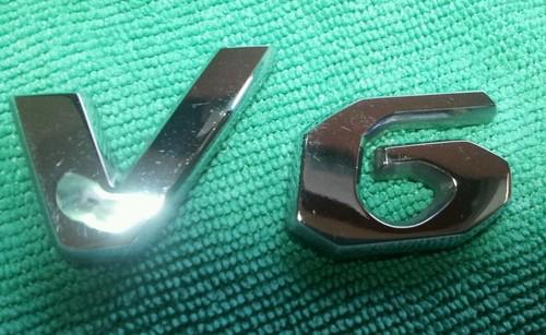 Hyundai tuscon v6 body side or tailgate emblem.