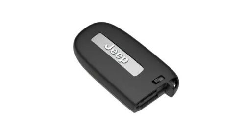 Genuine mopar integrated key fob transmitter 68143500ac