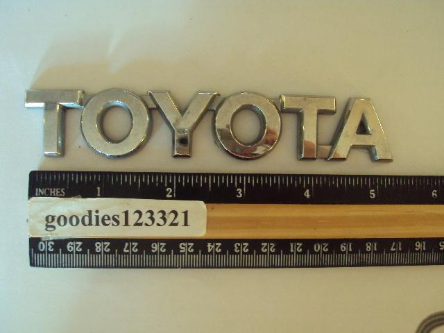 Toyota chrome emblem used 4 3/4" x 3/4"