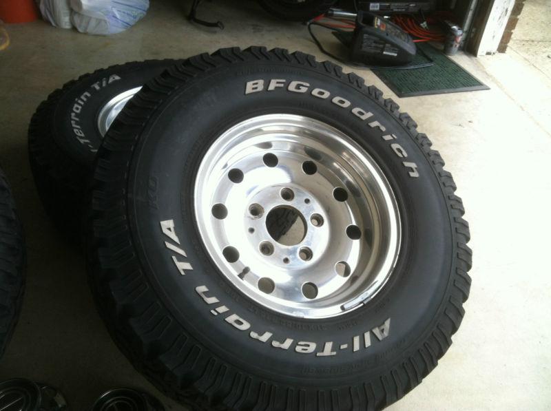 Ford bronco, f150 alum 3136 wheels, center caps, bf goodrich tires, good cond.