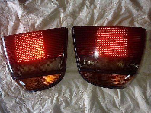 95-02 vw volkswagen cabrio golf gti hella oem smoked tail lights