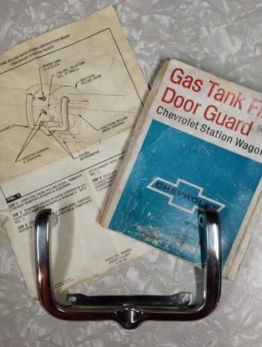 1965-66 chevy impala station wagon nos gas door guard         