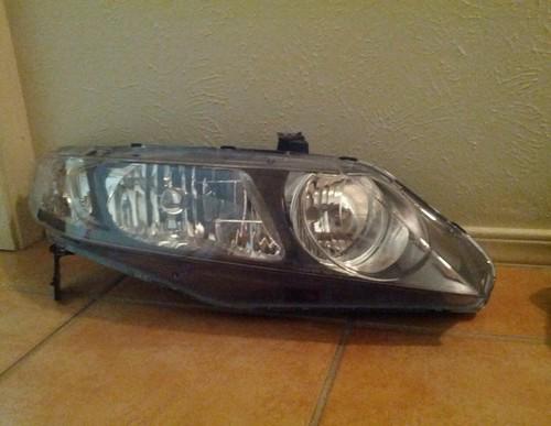 Used 06-08 honda civic 4 door right and left side headlights oem