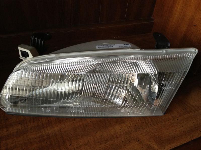 Toyota camry driver side lh headlight assembly tyc 20-3598-00