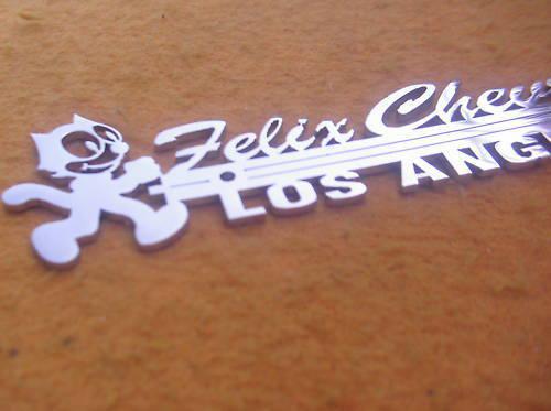 Awesome s.s. felix chevrolet die cut nameplate..w/ cat....reduced 15% 