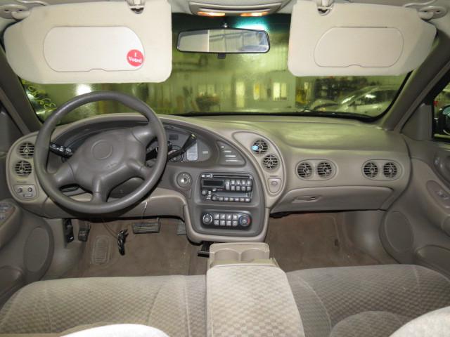 2000 pontiac bonneville speedomter and radio trim dash bezel 2528346