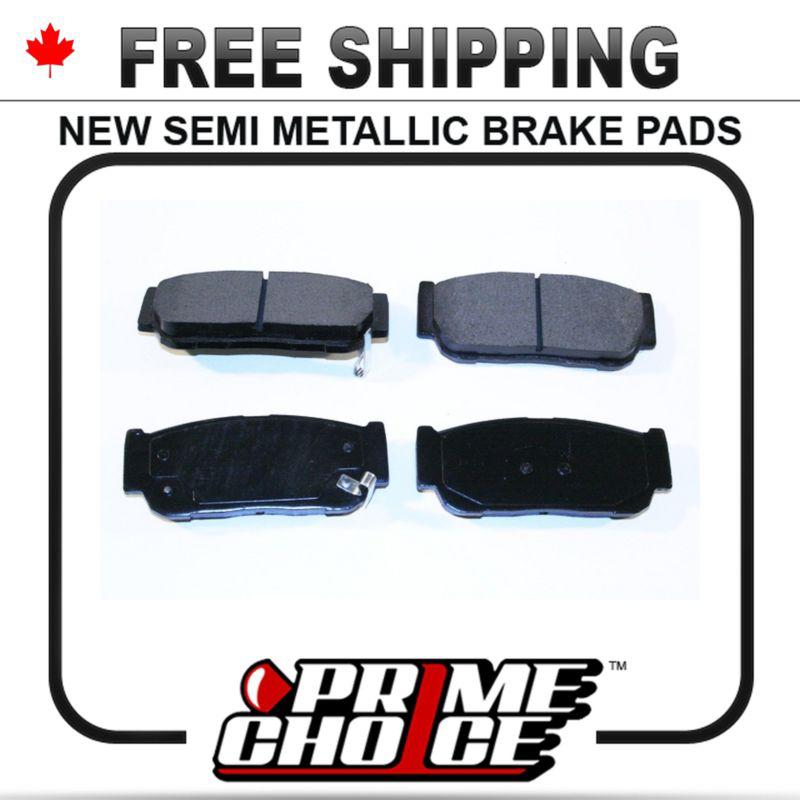 New premium complete set of rear metallic disc brake pads with shims