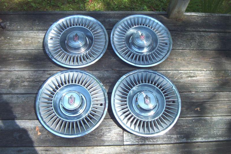 Oe set of 4 knights head 1981 monte carlo 14 inch wheelcovers, 40 rib # 3142