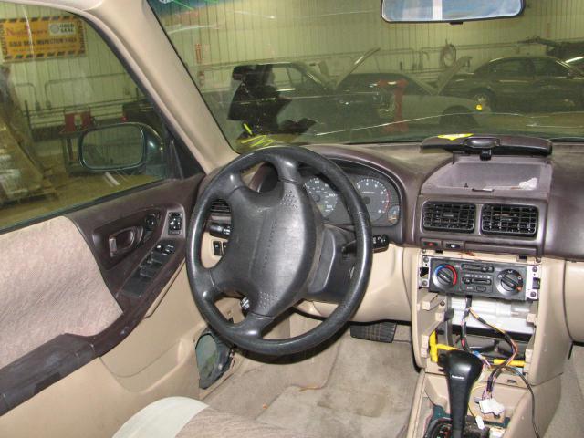 1999 subaru forester front passenger seat belt & retractor only tan