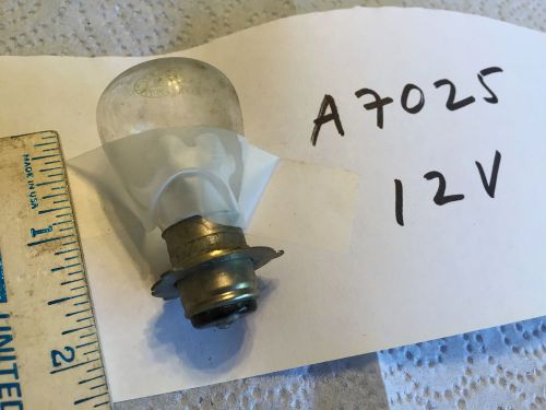 Ford; chrysler; gm; studebaker; old car light bulb,   pn a7025.   item:  0079