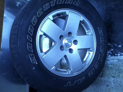 (4)bridgestone dueler at 18in =4 jeep wheels =with tpm sensors