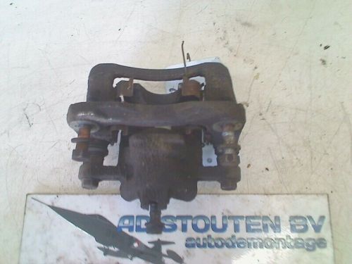 2009 hyundai i20 hatchback 1.4i 16v (g4fa) left rear brake caliper #150921-