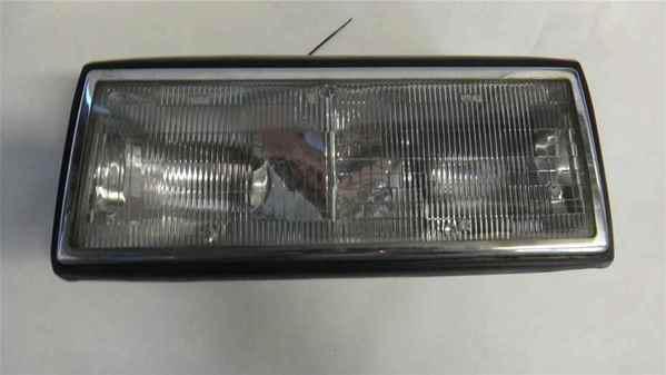 91-93 cadillac deville driver headlight oem