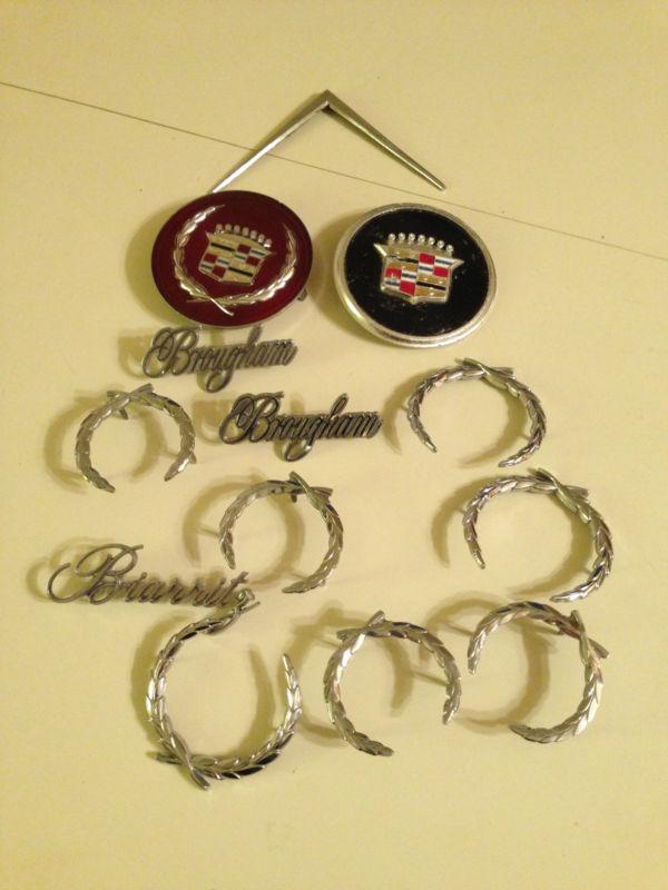 Lot of 13 cadillac emblems 