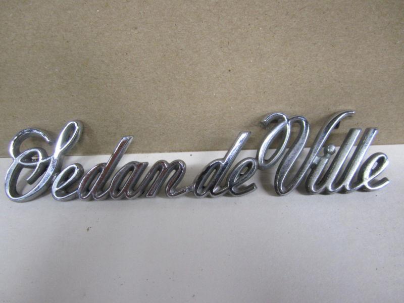 Cadillac  sedan deville  emblem ornament "sedan de ville" chrome plastic oe