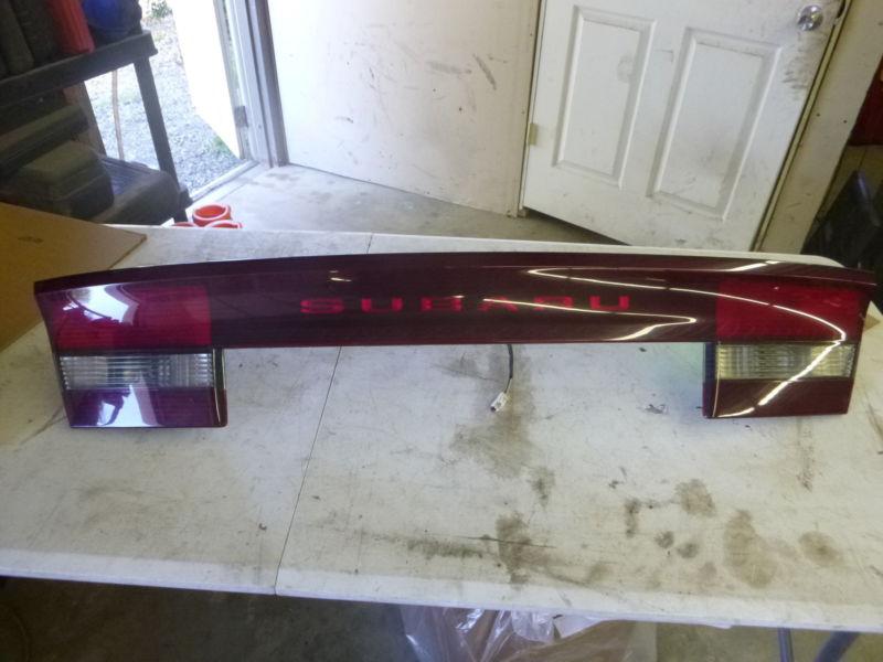 2001 - 2004 subaru legacy sedan center tail light panel