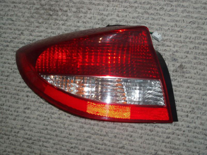 Kia rio   tail lights rear left    side  full assembly   2005 with free s/h