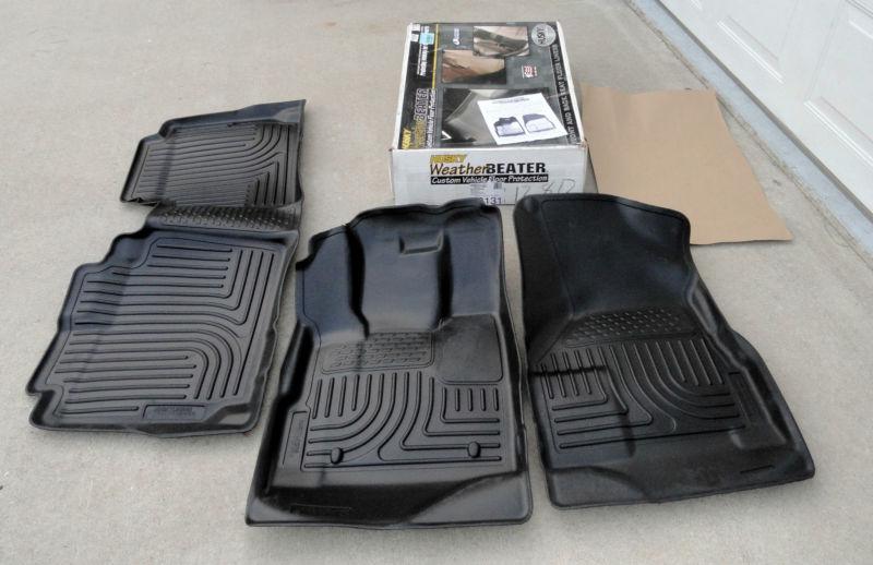 Husky liners custom fit front and second seat floor liner set for select chevrol