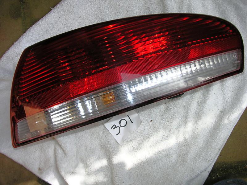 2002 chrysler sebring convertible rt. pass side tail light good 58622 e rh