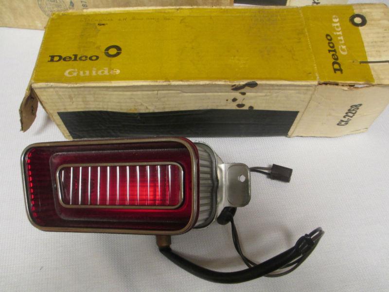 Nos 1969 chevrolet caprice tail light assembly socket and lens, oem gm delco