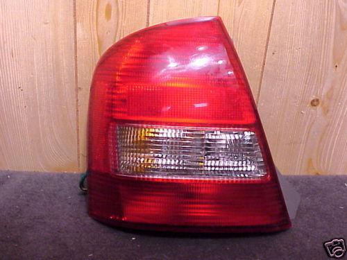 Mazda protege 99-03 1999-2003 tail light driver lh left