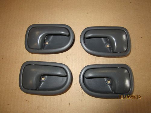 4 handle, inside gray( 2 front &amp; 2 rear ) mazda protege 1995-1996-1997-1998