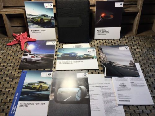 2015 bmw m4 coupe owners manual + navigation book ((buy new oem)) was sealed