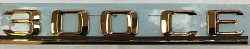 Nos new genuine mercedes benz 300ce gold emblem