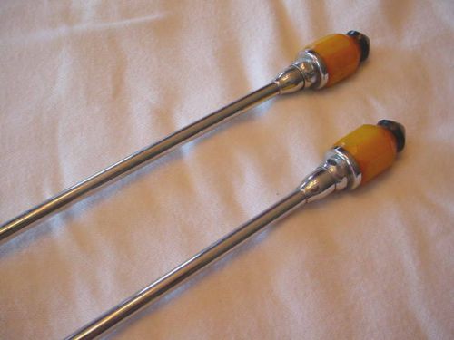 Boat antennas pair vintage butterscotch  bakelite with black tips