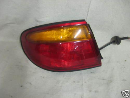 96-98 millenia oem left tail light nice!